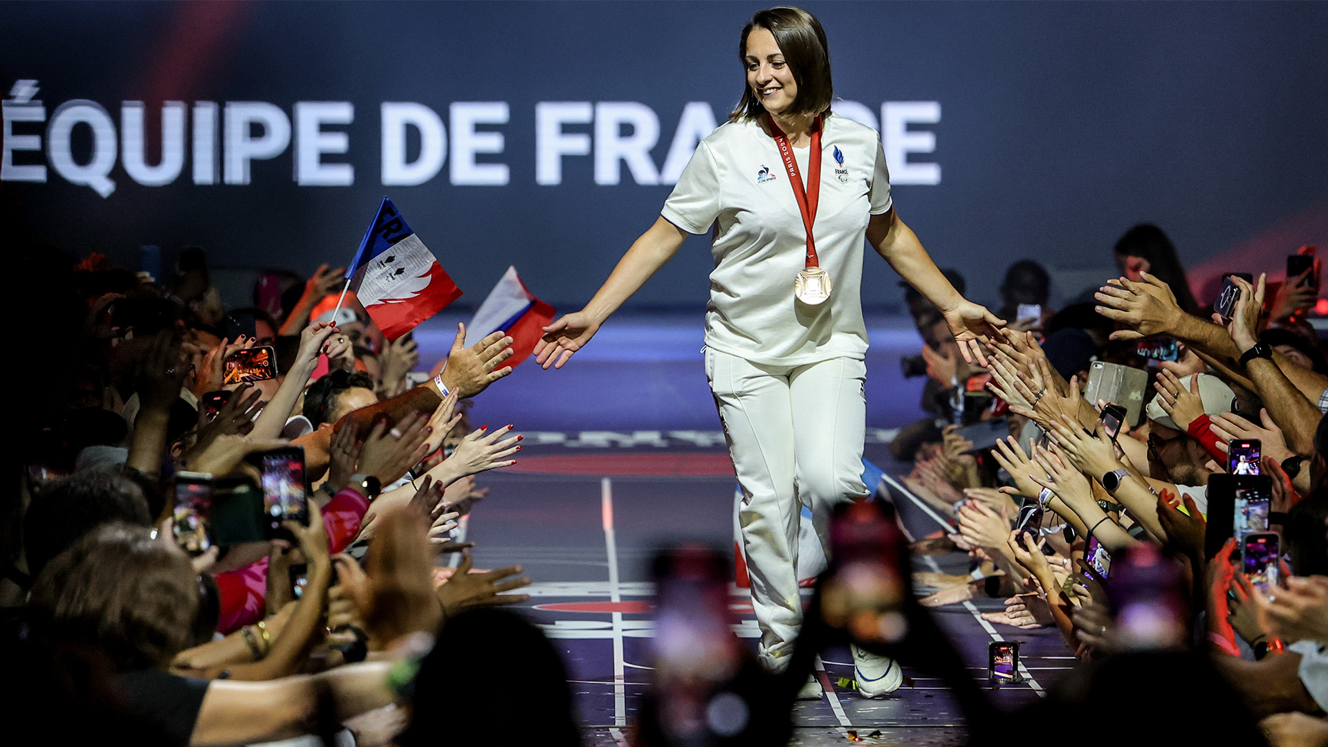 PARIS 2024 / Faustine Noël, soutenue par Natixis TradEx Solutions, lors de sa célébration au Club France